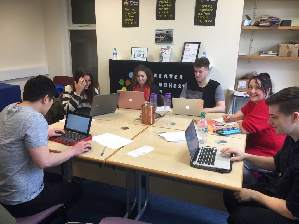 Image Caption: Lily (centre-left) and Robert (centre-right) researching for GMLC)