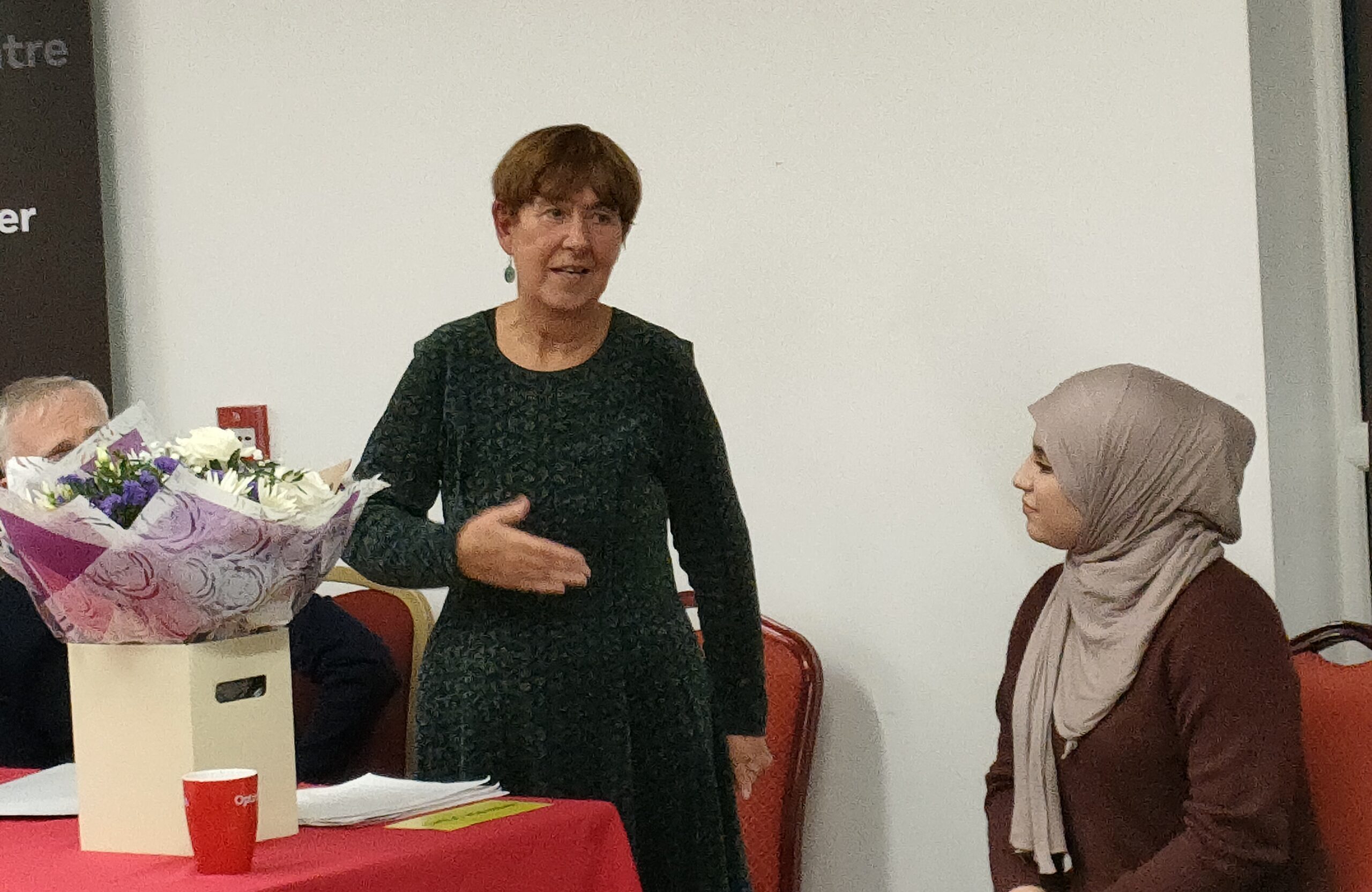 Our outgoing Treasurer Norma Turner with her leaving gift alongside incoming trustee Arwa Graf.